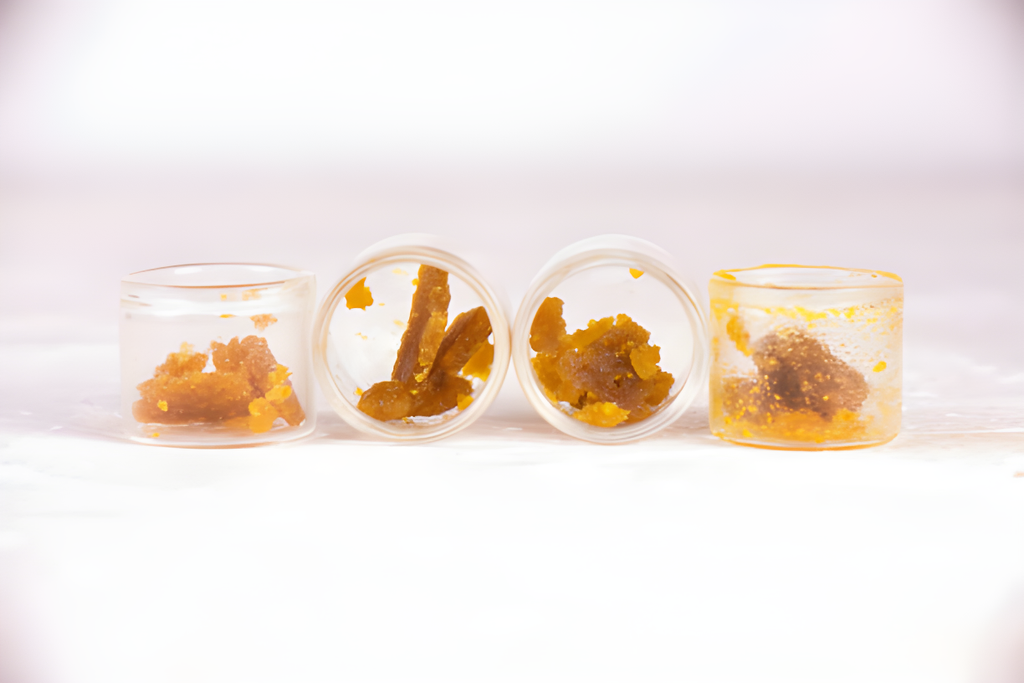 Side-by-side comparison of shatter, wax, and crumble concentrates.